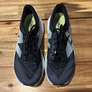 EUC - New Balance FuelCell Rebel v4- graphite/black - sz 11.5
